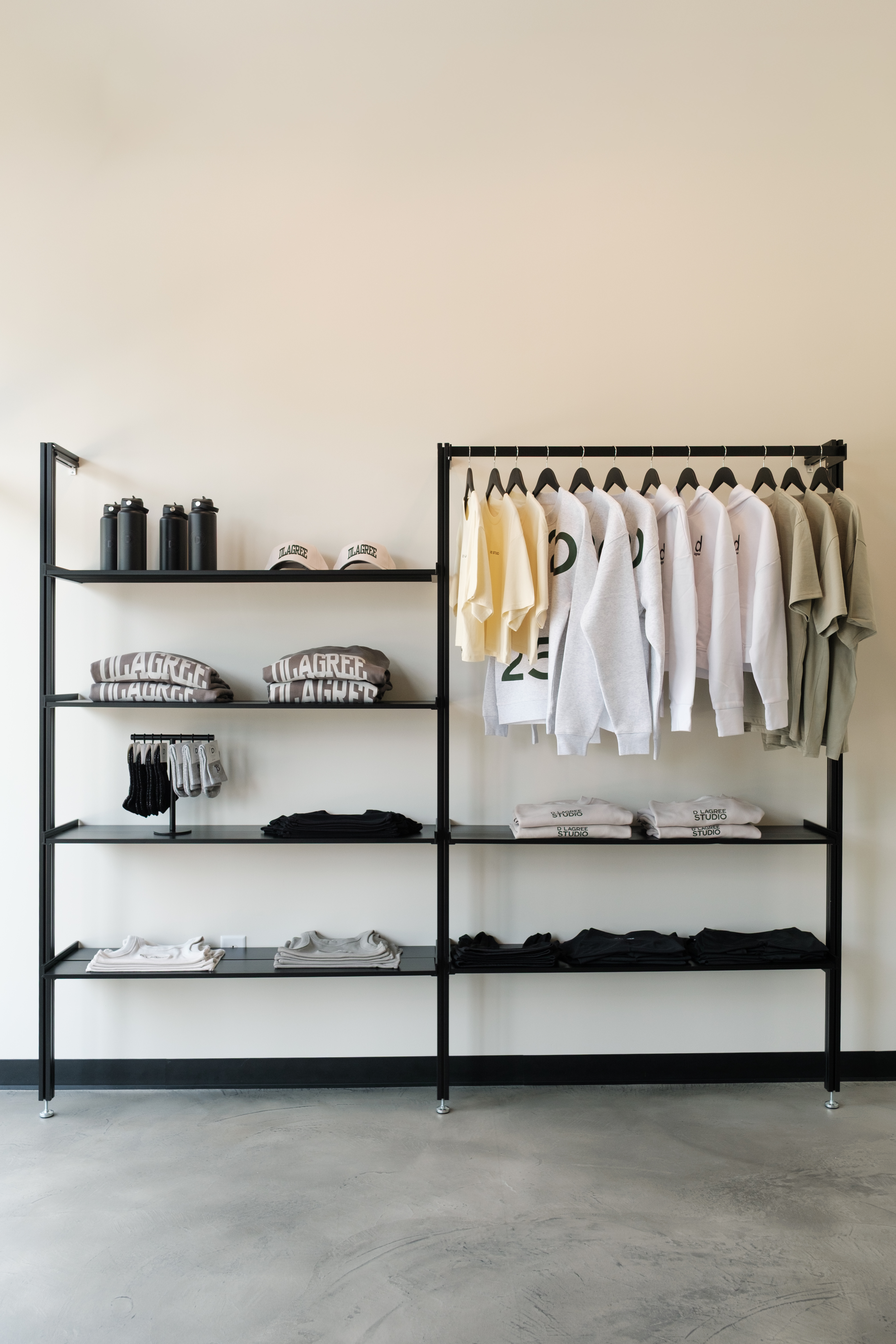 D Lagree studio retail display with branded apparel